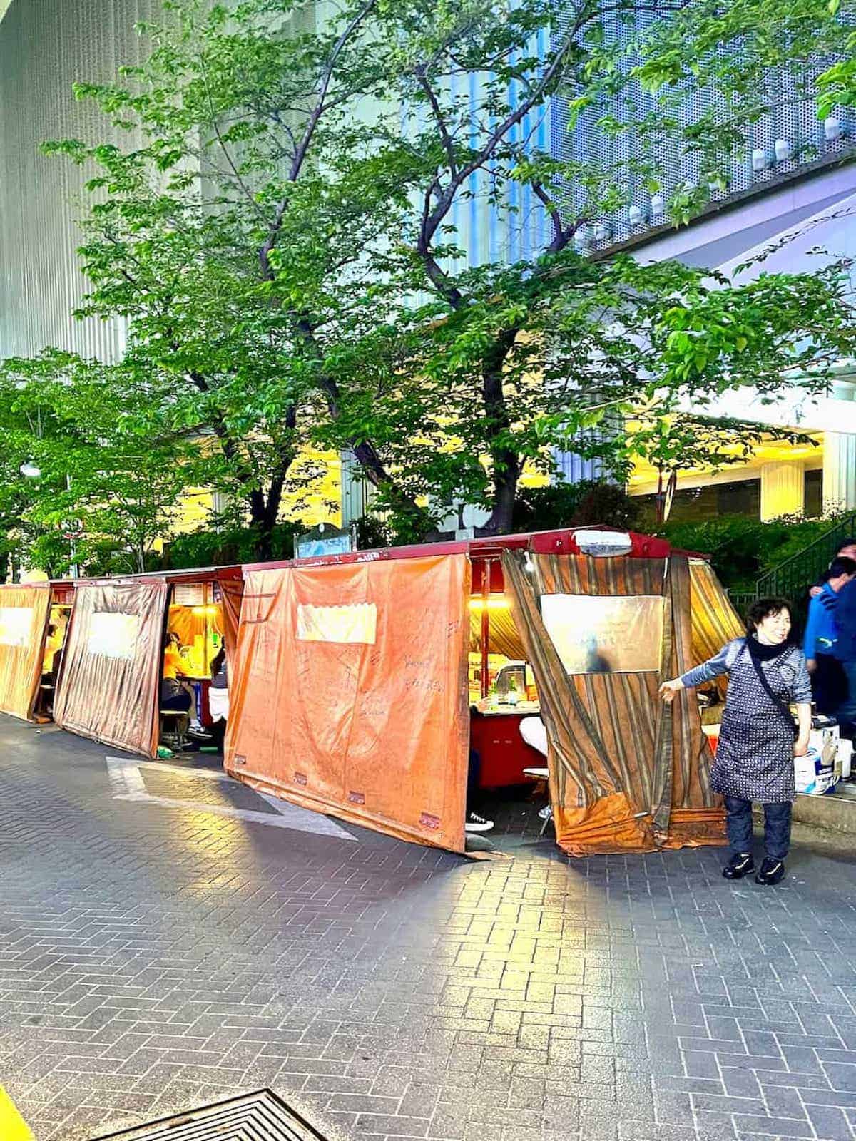 Pojiongmacha orange street food tents in Seomyeon, Busan, Korea.