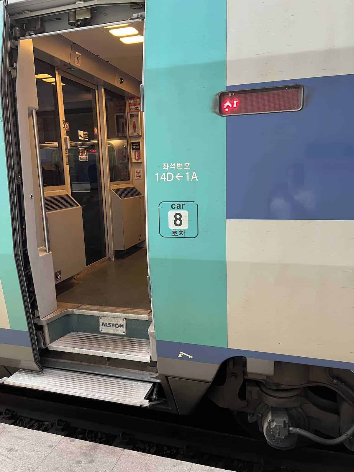 The steps leading up to the KTX train carriage at Seoul Station.