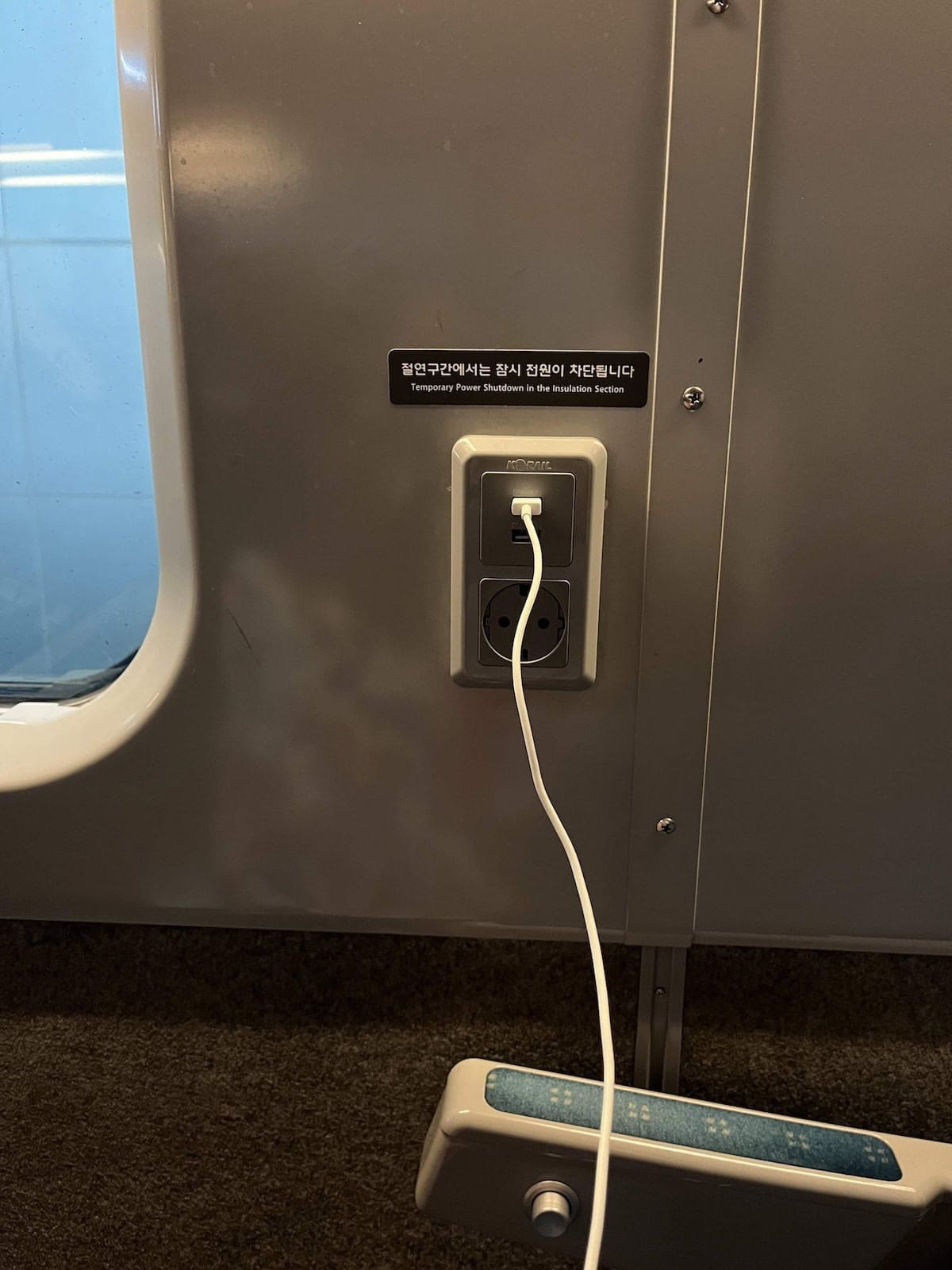 Power socket to charge your phone next to the KTX seat.